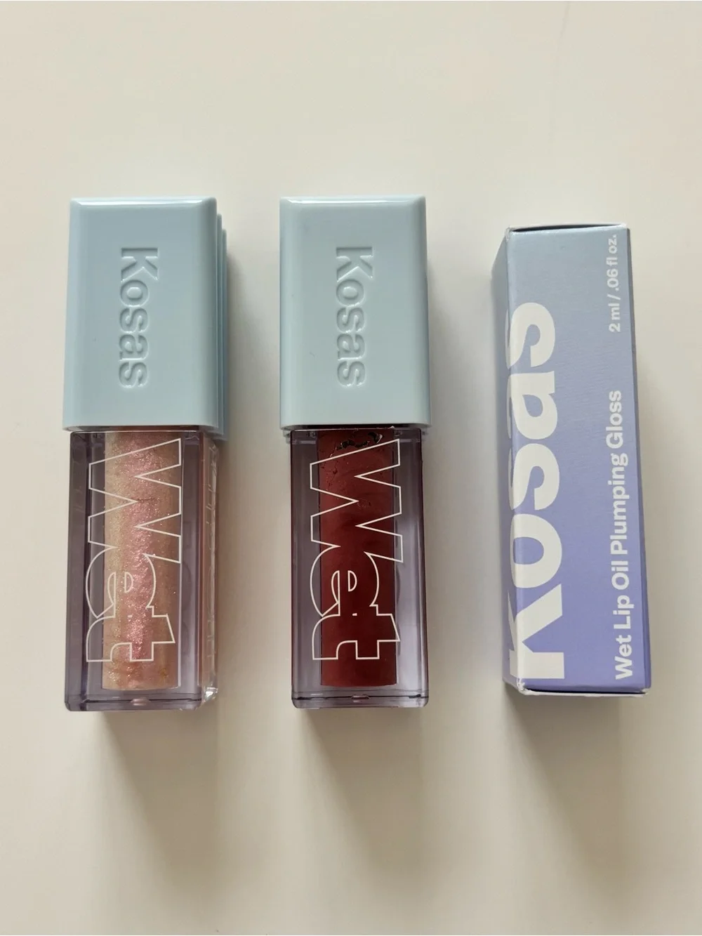 Kosas Wet Lip Oil Plumping Gloss in Unbuttoned, Exposed, and Jellyfish